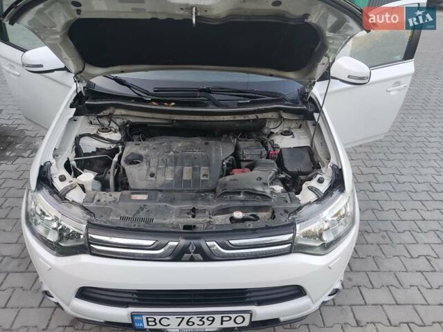 Белый Мицубиси Аутлендер, объемом двигателя 2.3 л и пробегом 228 тыс. км за 14700 $, фото 14 на Automoto.ua