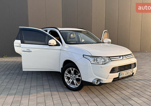 Білий Міцубісі Аутлендер, об'ємом двигуна 2.4 л та пробігом 240 тис. км за 12000 $, фото 11 на Automoto.ua