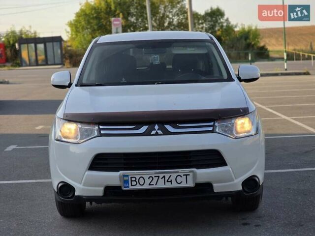 Белый Мицубиси Аутлендер, объемом двигателя 2.4 л и пробегом 183 тыс. км за 12499 $, фото 2 на Automoto.ua