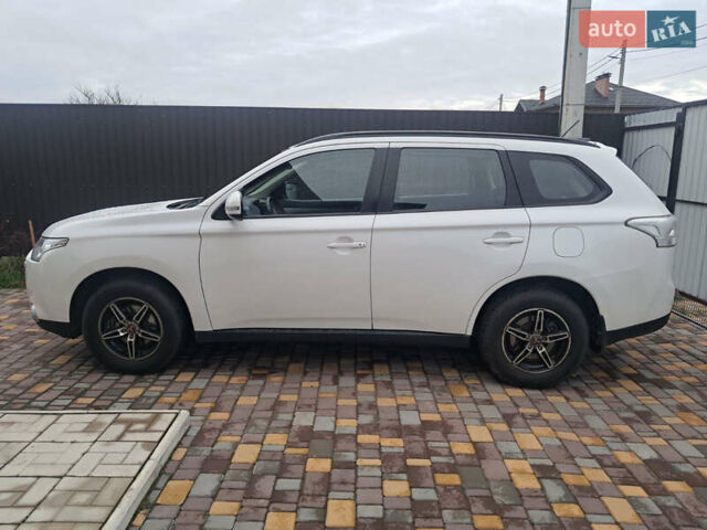 Білий Міцубісі Аутлендер, об'ємом двигуна 2.36 л та пробігом 112 тис. км за 14900 $, фото 3 на Automoto.ua