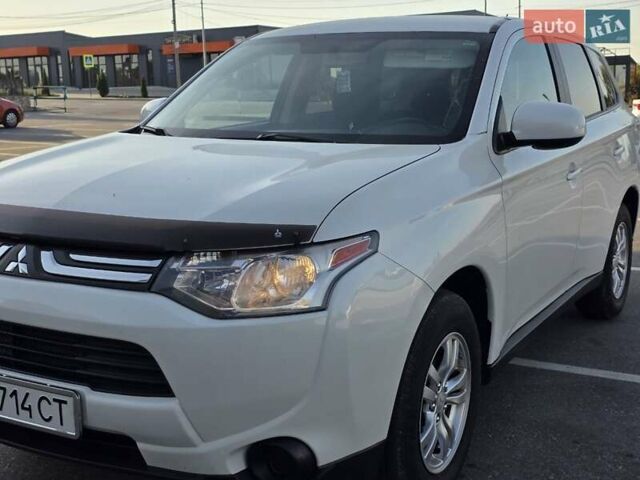 Белый Мицубиси Аутлендер, объемом двигателя 2.4 л и пробегом 183 тыс. км за 12499 $, фото 13 на Automoto.ua