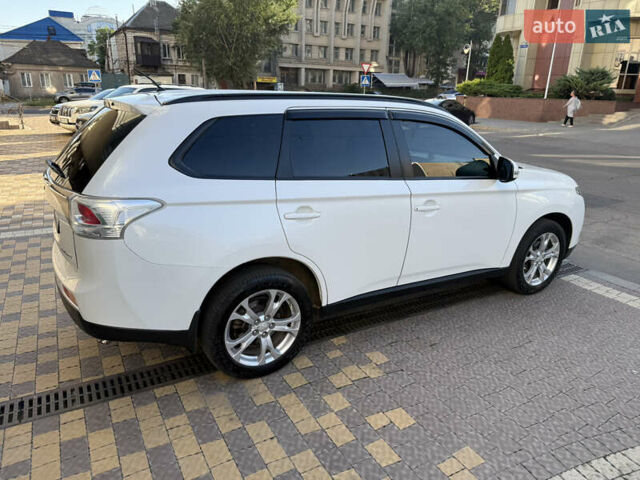 Білий Міцубісі Аутлендер, об'ємом двигуна 2.36 л та пробігом 146 тис. км за 14300 $, фото 16 на Automoto.ua