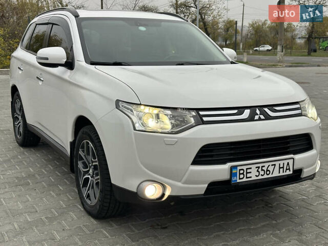 Белый Мицубиси Аутлендер, объемом двигателя 2.4 л и пробегом 175 тыс. км за 13900 $, фото 11 на Automoto.ua