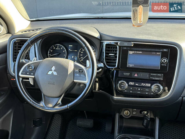 Белый Мицубиси Аутлендер, объемом двигателя 2.4 л и пробегом 148 тыс. км за 12900 $, фото 25 на Automoto.ua