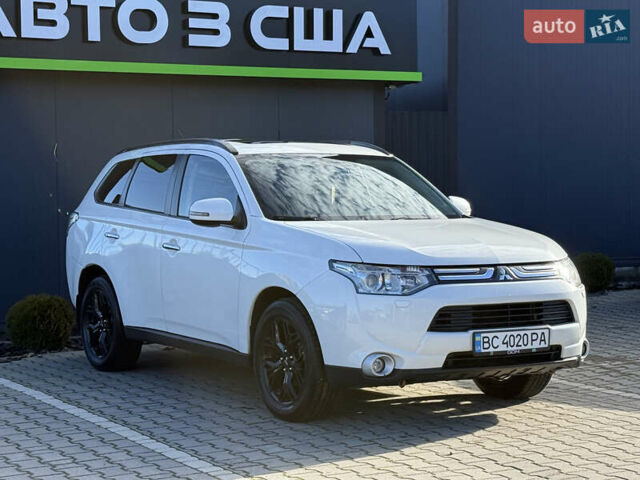 Белый Мицубиси Аутлендер, объемом двигателя 2.4 л и пробегом 148 тыс. км за 12900 $, фото 4 на Automoto.ua