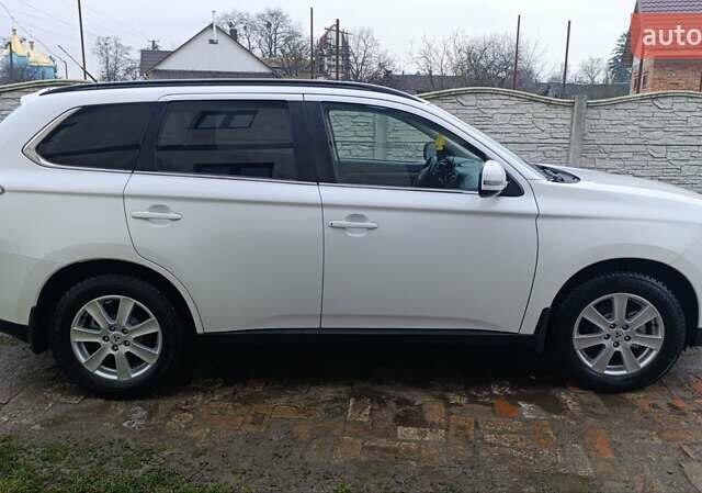 Белый Мицубиси Аутлендер, объемом двигателя 2.2 л и пробегом 278 тыс. км за 12600 $, фото 7 на Automoto.ua