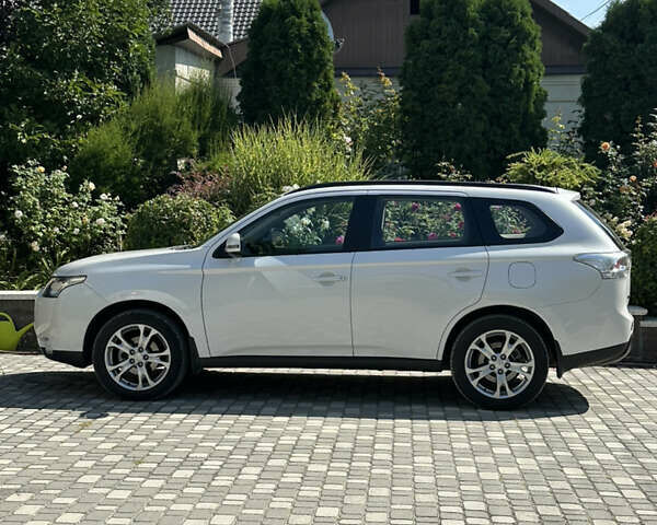 Белый Мицубиси Аутлендер, объемом двигателя 2.4 л и пробегом 114 тыс. км за 16800 $, фото 2 на Automoto.ua