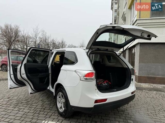 Белый Мицубиси Аутлендер, объемом двигателя 0 л и пробегом 180 тыс. км за 11500 $, фото 28 на Automoto.ua