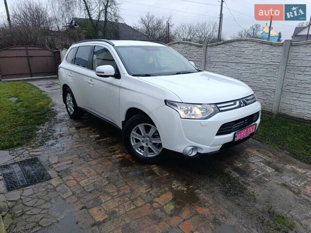 Белый Мицубиси Аутлендер, объемом двигателя 2.2 л и пробегом 278 тыс. км за 12600 $, фото 1 на Automoto.ua