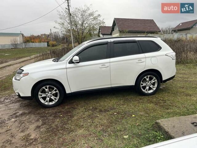 Міцубісі Аутлендер 2013 у Харкові на Automoto.ua Білий Міцубісі Аутлендер, об'ємом двигуна 2.4 л та пробігом 209 тис. км за 13000 $, фото 6 на Automoto.ua