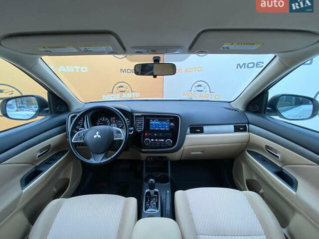 Белый Мицубиси Аутлендер, объемом двигателя 2.4 л и пробегом 215 тыс. км за 9999 $, фото 6 на Automoto.ua