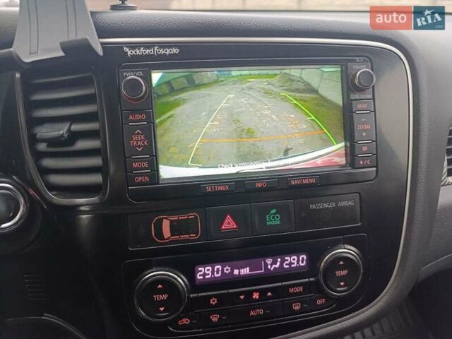 Белый Мицубиси Аутлендер, объемом двигателя 2.2 л и пробегом 278 тыс. км за 12600 $, фото 44 на Automoto.ua