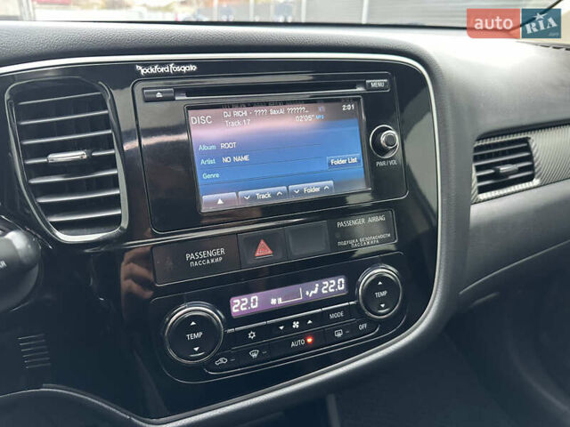 Белый Мицубиси Аутлендер, объемом двигателя 2.4 л и пробегом 175 тыс. км за 13900 $, фото 45 на Automoto.ua