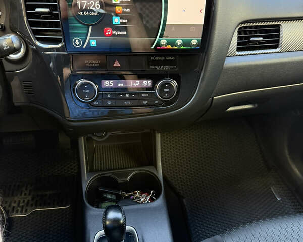 Білий Міцубісі Аутлендер, об'ємом двигуна 2.36 л та пробігом 146 тис. км за 14300 $, фото 25 на Automoto.ua