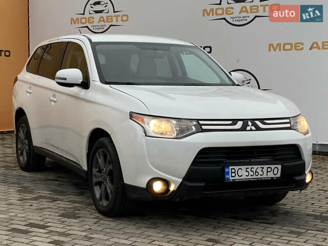 Белый Мицубиси Аутлендер, объемом двигателя 2.36 л и пробегом 215 тыс. км за 9500 $, фото 3 на Automoto.ua