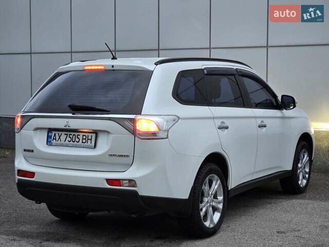 Міцубісі Аутлендер 2013 у Харкові на Automoto.ua Білий Міцубісі Аутлендер, об'ємом двигуна 2.4 л та пробігом 146 тис. км за 12900 $, фото 6 на Automoto.ua