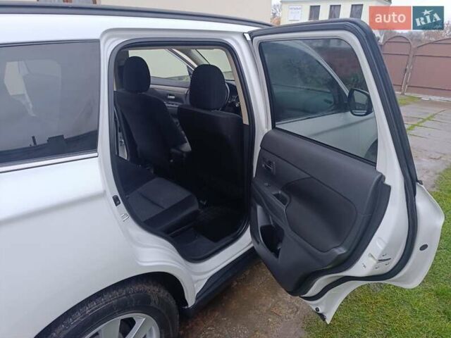 Белый Мицубиси Аутлендер, объемом двигателя 2.2 л и пробегом 278 тыс. км за 12600 $, фото 28 на Automoto.ua