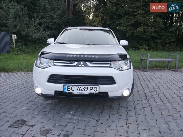 Белый Мицубиси Аутлендер, объемом двигателя 2.3 л и пробегом 228 тыс. км за 14700 $, фото 9 на Automoto.ua