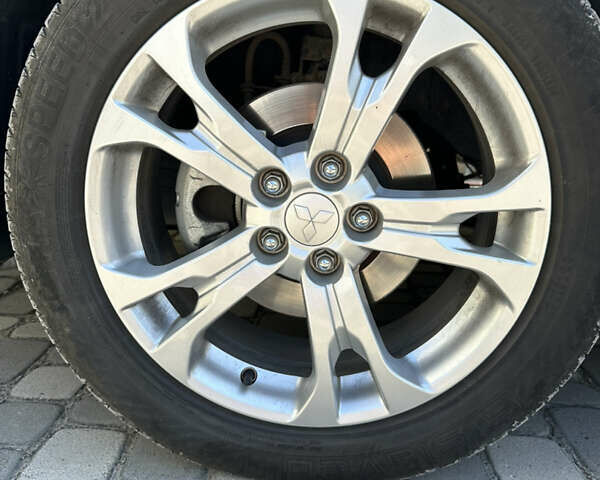 Белый Мицубиси Аутлендер, объемом двигателя 2.4 л и пробегом 114 тыс. км за 16800 $, фото 9 на Automoto.ua