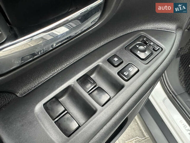 Белый Мицубиси Аутлендер, объемом двигателя 2.4 л и пробегом 175 тыс. км за 13900 $, фото 28 на Automoto.ua