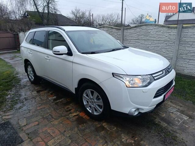 Белый Мицубиси Аутлендер, объемом двигателя 2.2 л и пробегом 278 тыс. км за 12600 $, фото 2 на Automoto.ua