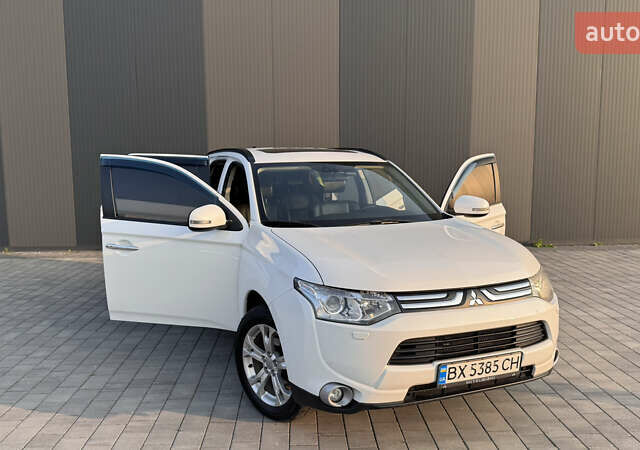Білий Міцубісі Аутлендер, об'ємом двигуна 2.4 л та пробігом 240 тис. км за 12000 $, фото 12 на Automoto.ua