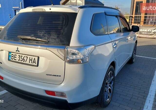 Белый Мицубиси Аутлендер, объемом двигателя 2.4 л и пробегом 175 тыс. км за 13800 $, фото 11 на Automoto.ua