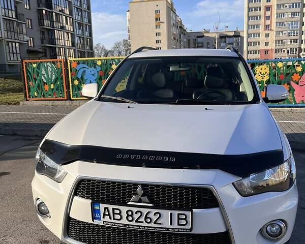 Белый Мицубиси Аутлендер, объемом двигателя 2.4 л и пробегом 340 тыс. км за 9900 $, фото 4 на Automoto.ua
