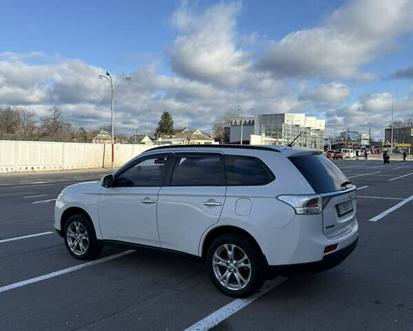 Белый Мицубиси Аутлендер, объемом двигателя 2.4 л и пробегом 147 тыс. км за 13500 $, фото 8 на Automoto.ua