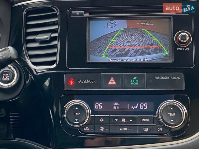 Белый Мицубиси Аутлендер, объемом двигателя 2.36 л и пробегом 215 тыс. км за 9500 $, фото 26 на Automoto.ua