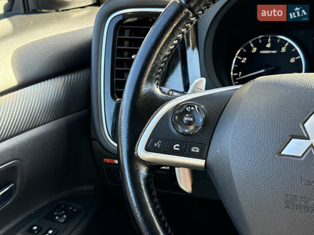 Белый Мицубиси Аутлендер, объемом двигателя 2.4 л и пробегом 148 тыс. км за 12900 $, фото 20 на Automoto.ua