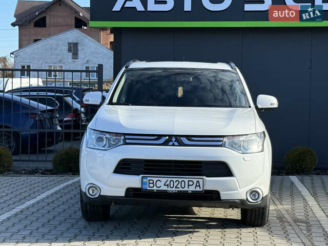 Белый Мицубиси Аутлендер, объемом двигателя 2.4 л и пробегом 148 тыс. км за 12900 $, фото 2 на Automoto.ua