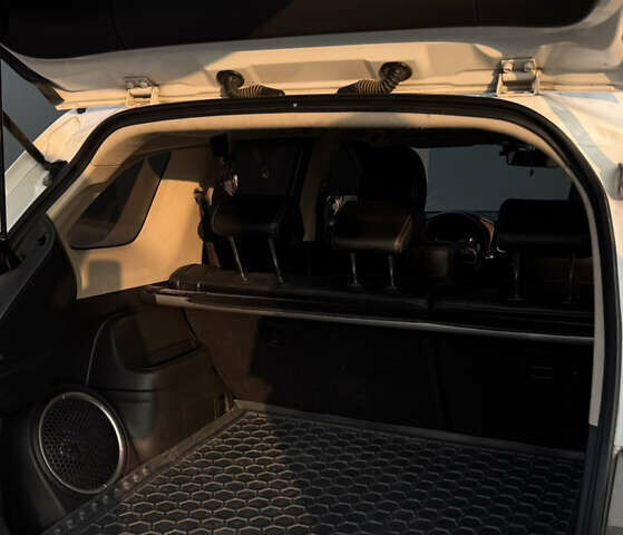 Білий Міцубісі Аутлендер, об'ємом двигуна 2.4 л та пробігом 240 тис. км за 12000 $, фото 20 на Automoto.ua