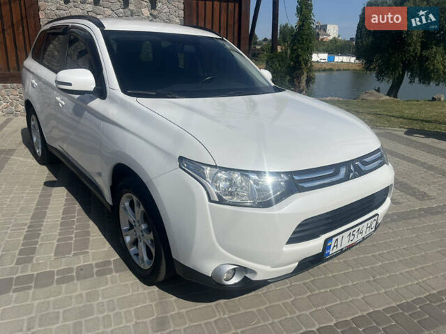 Білий Міцубісі Аутлендер, об'ємом двигуна 2 л та пробігом 127 тис. км за 14000 $, фото 4 на Automoto.ua
