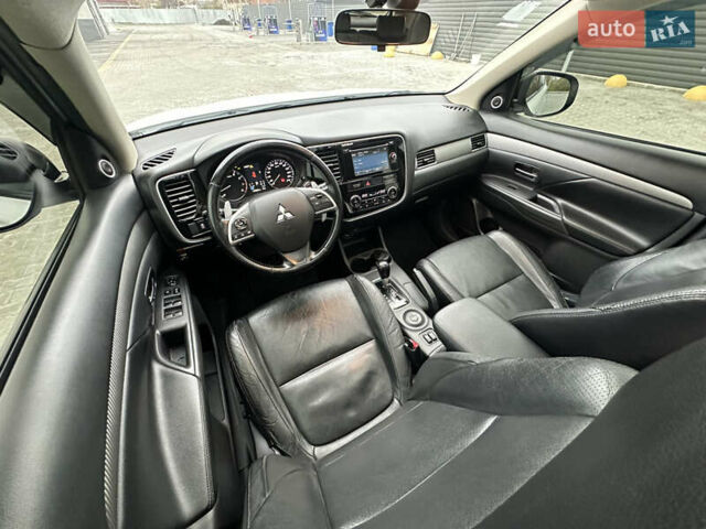 Белый Мицубиси Аутлендер, объемом двигателя 2.4 л и пробегом 175 тыс. км за 13900 $, фото 33 на Automoto.ua