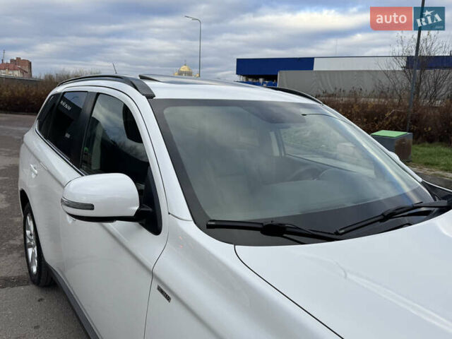 Белый Мицубиси Аутлендер, объемом двигателя 2.3 л и пробегом 214 тыс. км за 15499 $, фото 14 на Automoto.ua