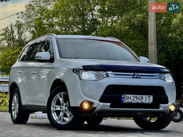 Белый Мицубиси Аутлендер, объемом двигателя 2.4 л и пробегом 140 тыс. км за 12900 $, фото 19 на Automoto.ua