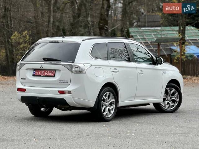 Белый Мицубиси Аутлендер, объемом двигателя 2 л и пробегом 210 тыс. км за 14300 $, фото 32 на Automoto.ua