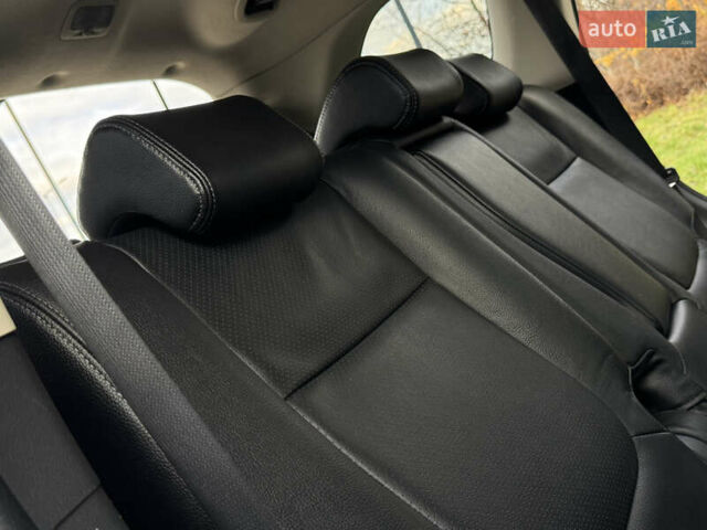 Белый Мицубиси Аутлендер, объемом двигателя 2.3 л и пробегом 214 тыс. км за 15499 $, фото 141 на Automoto.ua