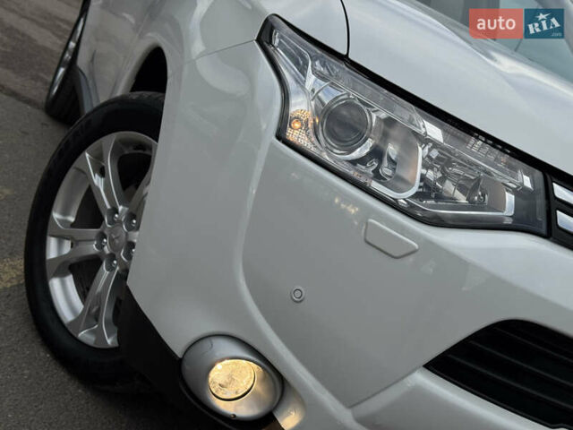 Белый Мицубиси Аутлендер, объемом двигателя 2.3 л и пробегом 214 тыс. км за 15499 $, фото 10 на Automoto.ua