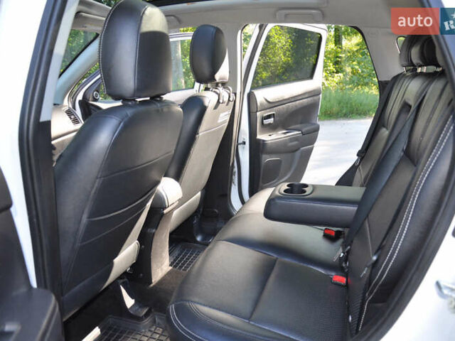 Белый Мицубиси Аутлендер, объемом двигателя 2 л и пробегом 132 тыс. км за 11500 $, фото 21 на Automoto.ua