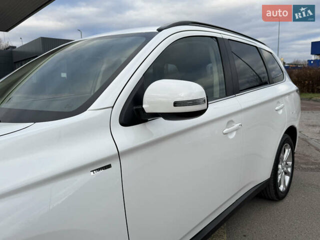 Белый Мицубиси Аутлендер, объемом двигателя 2.3 л и пробегом 214 тыс. км за 15499 $, фото 38 на Automoto.ua