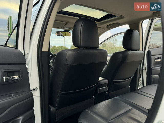 Белый Мицубиси Аутлендер, объемом двигателя 2.3 л и пробегом 214 тыс. км за 15499 $, фото 129 на Automoto.ua