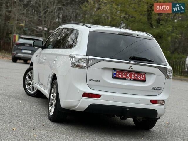 Белый Мицубиси Аутлендер, объемом двигателя 2 л и пробегом 210 тыс. км за 14300 $, фото 22 на Automoto.ua