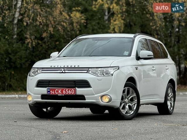 Белый Мицубиси Аутлендер, объемом двигателя 2 л и пробегом 210 тыс. км за 14300 $, фото 14 на Automoto.ua