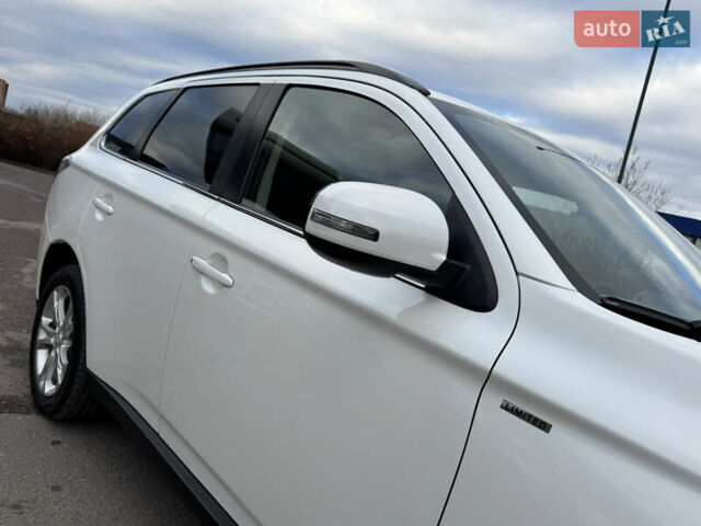 Белый Мицубиси Аутлендер, объемом двигателя 2.3 л и пробегом 214 тыс. км за 15499 $, фото 16 на Automoto.ua