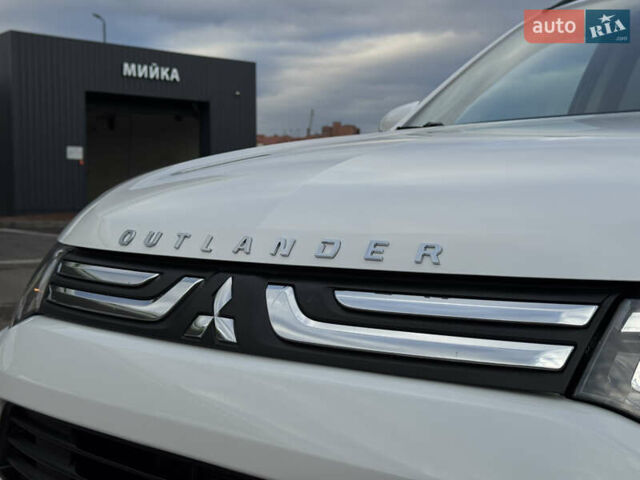 Белый Мицубиси Аутлендер, объемом двигателя 2.3 л и пробегом 214 тыс. км за 15499 $, фото 30 на Automoto.ua