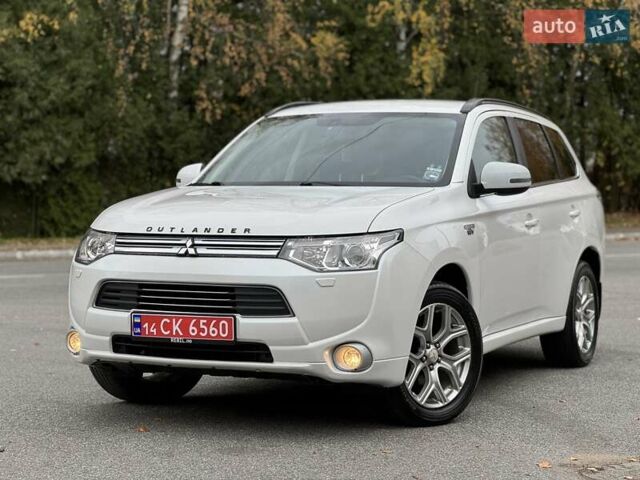 Белый Мицубиси Аутлендер, объемом двигателя 2 л и пробегом 210 тыс. км за 14300 $, фото 11 на Automoto.ua
