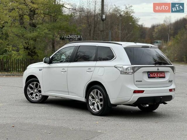 Белый Мицубиси Аутлендер, объемом двигателя 2 л и пробегом 210 тыс. км за 14300 $, фото 23 на Automoto.ua