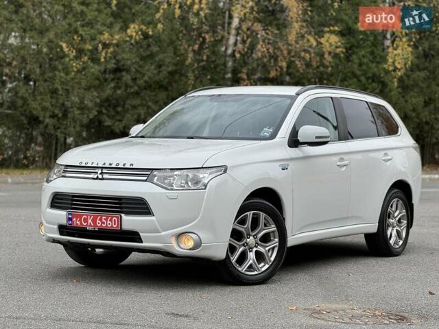 Белый Мицубиси Аутлендер, объемом двигателя 2 л и пробегом 210 тыс. км за 14300 $, фото 12 на Automoto.ua